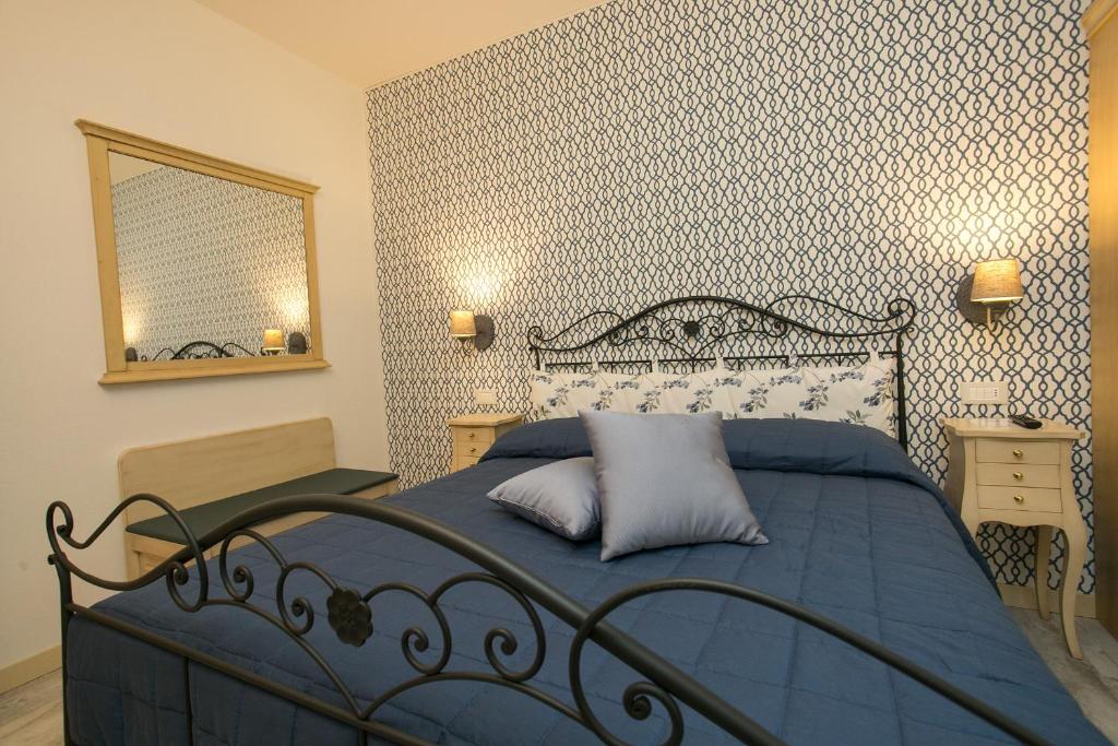 Postel nebo postele na pokoji v ubytování Guest House Dolce Laguna