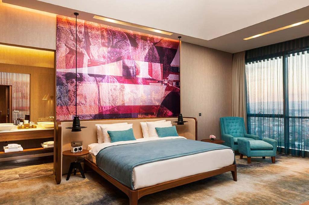 Cama ou camas em um quarto em Tasigo Eskisehir