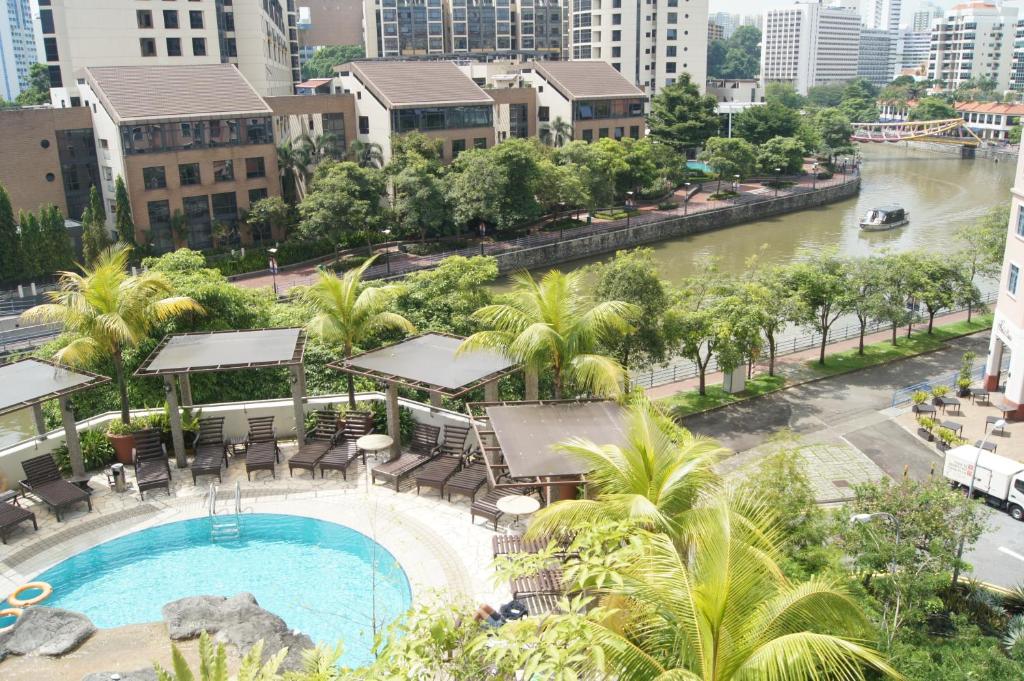 an aerial view of a swimming pool in a city at Robertson Quay Hotel in Singapore