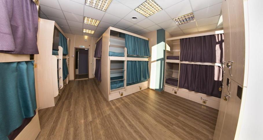 Двухъярусная кровать или двухъярусные кровати в номере Хостел Авача