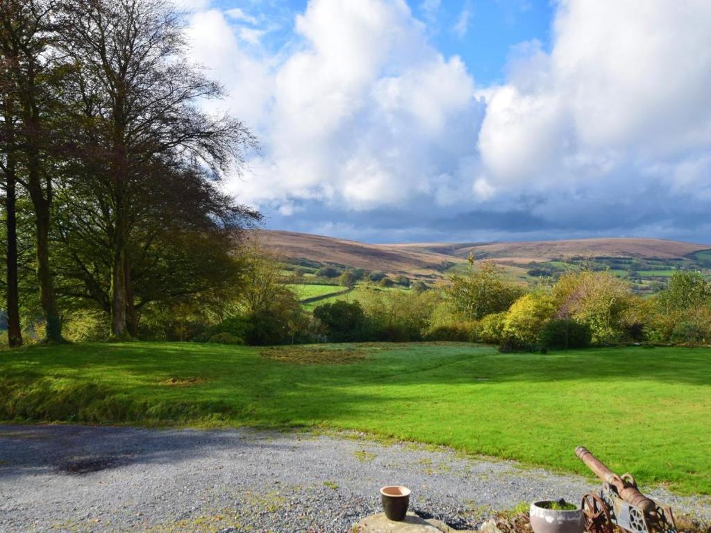 a view of a yard with a field of grass at 2 Bed in Minehead oc-77363 in Withypool