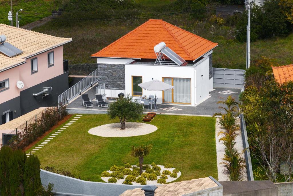 an aerial view of a house with an orange roof at Exceptional stone character house Chalet Prazeres in Prazeres