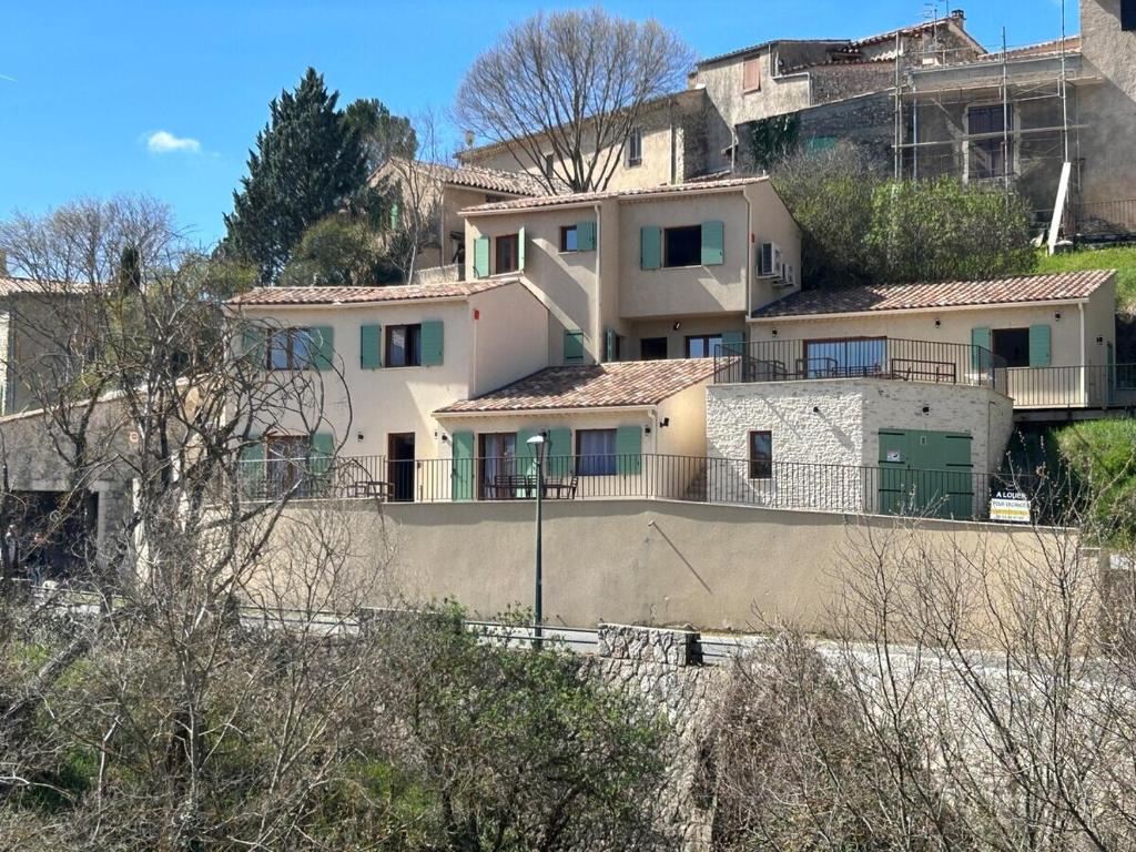 a house on the side of a hill at L'échappée du Verdon in Esparron-de-Verdon