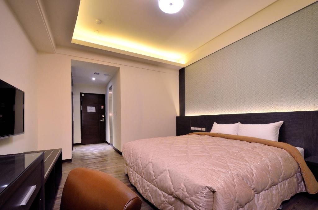TV a/nebo společenská místnost v ubytování Yundu Business Hotel