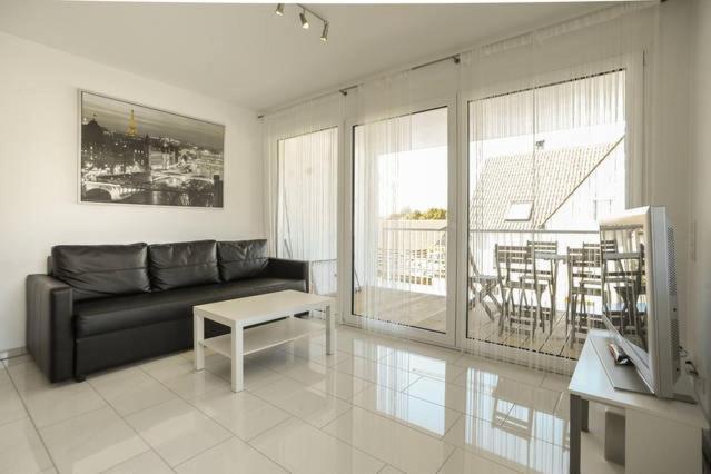 Posezení v ubytování Design Apartment Metzingen
