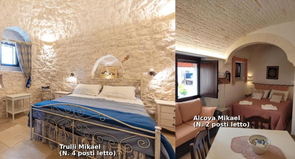 a bedroom with a bed in a stone wall at Valle D'Itria Trulli e Alcova Mikael in Cisternino