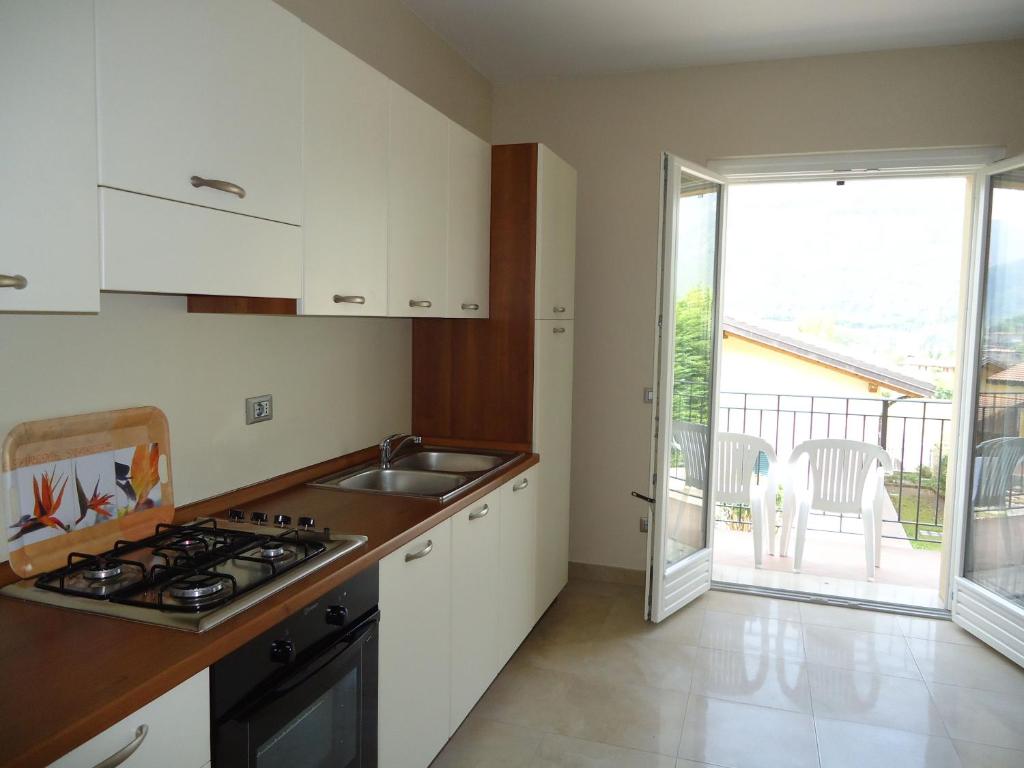 Kuchyň nebo kuchyňský kout v ubytování Villa Ninfea