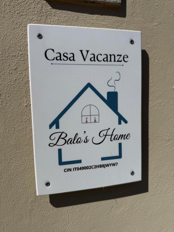 a sign for aaazona babies home on a wall at Balo’s home in Venturina Terme