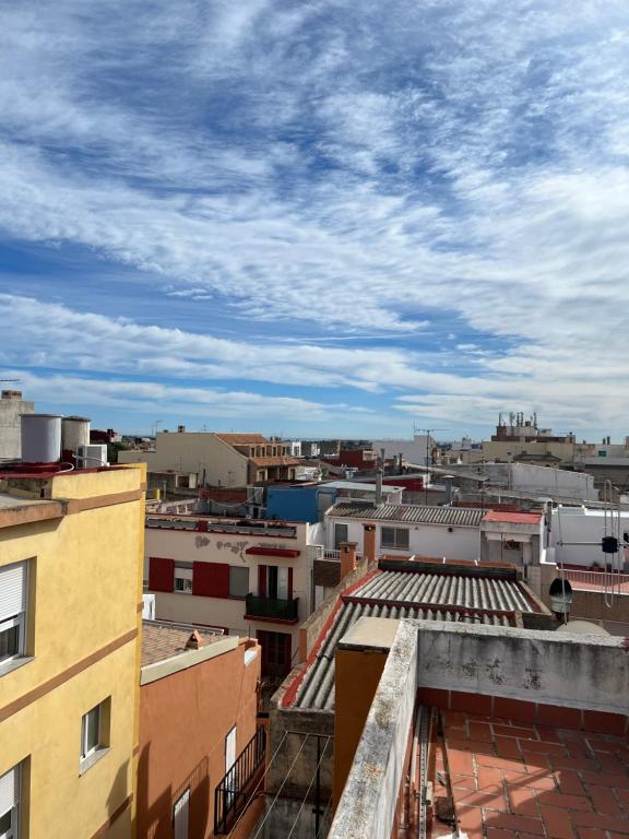 a view of a city from the roof of a building at Pasarla rico in Torreblanca