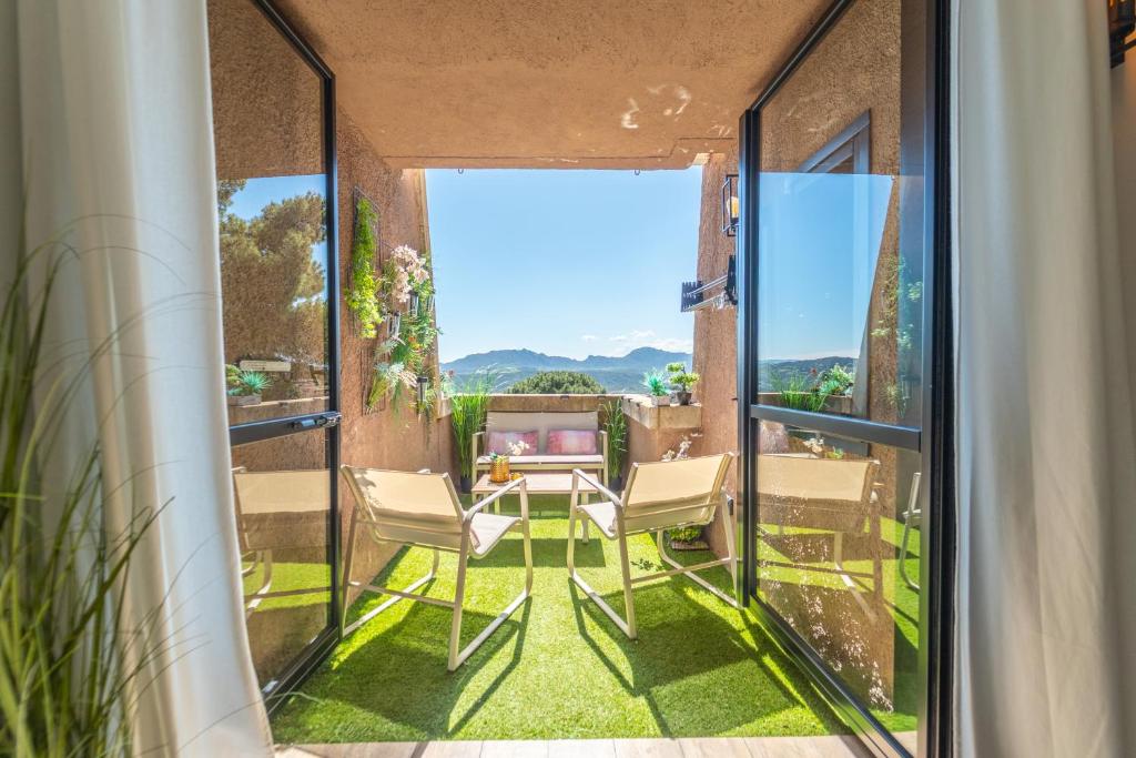 a view from the balcony of a house at SOL Y LUNA 11 Apartment in Sardinia close to the beach and to Olbia airport in Olbia