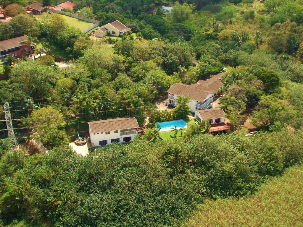 an aerial view of a house in the trees at Dieu Donnee River Lodge in Port Shepstone
