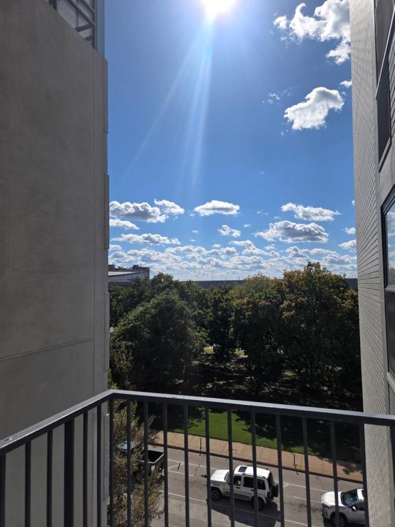 a view from the balcony of a building at Convenient Downtown Apartment in Saint Louis