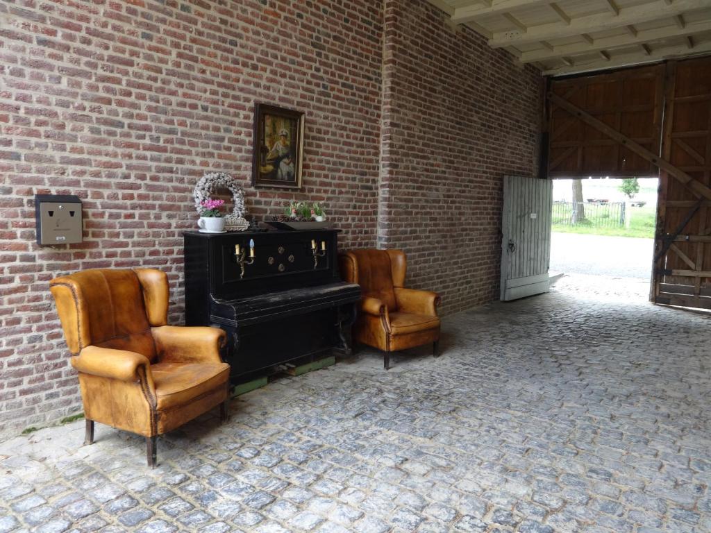 Posezení v ubytování De Verborgen Parel B&B