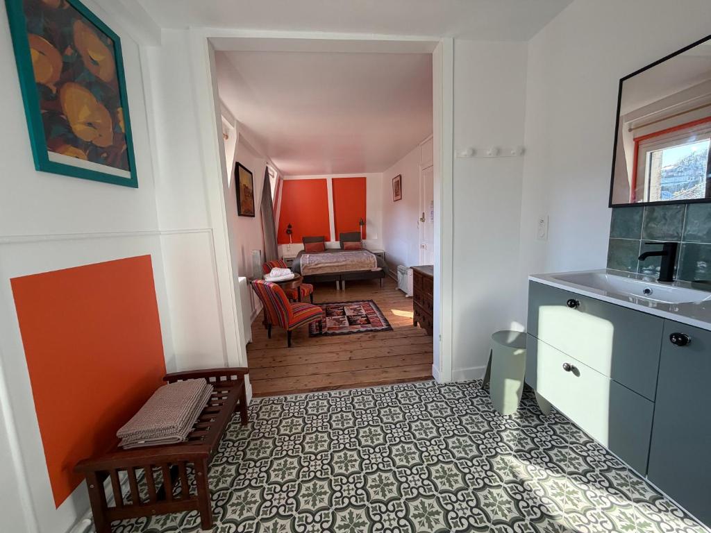 a room with a kitchen and a living room at VILLA des Peintres in Étretat
