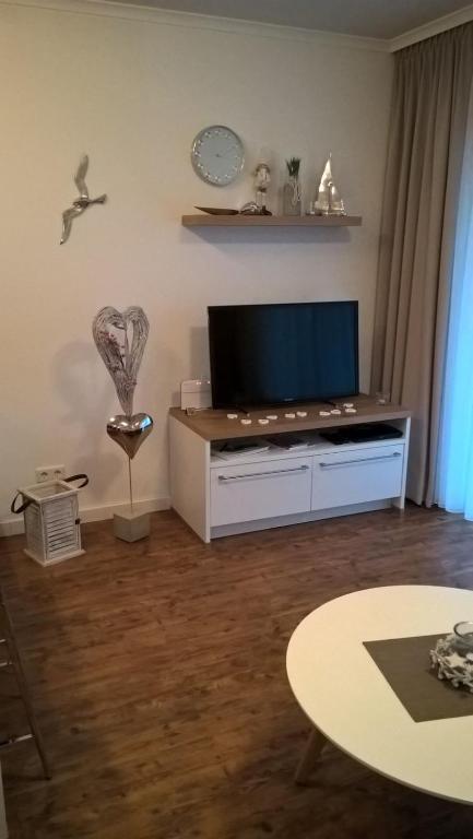 TV a/nebo společenská místnost v ubytování Residenz Am Meer