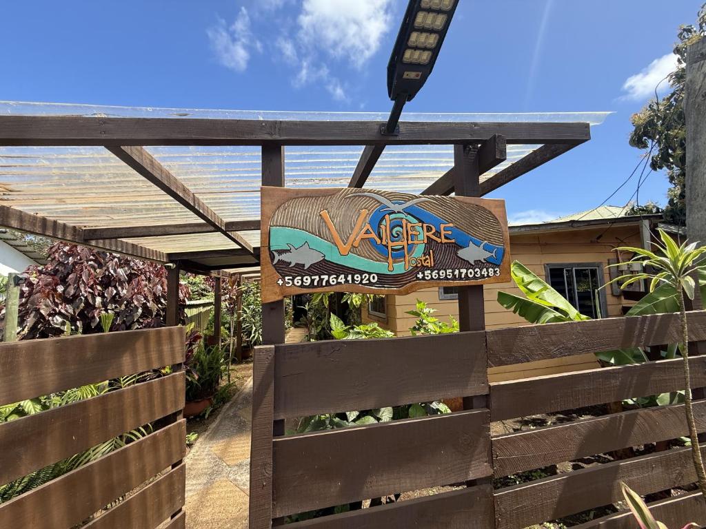 a sign for the entrance to a restaurant at Hostal Vaihere in Hanga Roa
