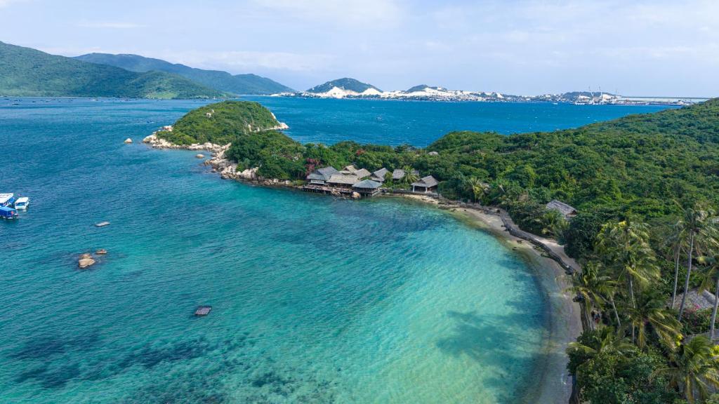 an aerial view of an island in the ocean at Whale Island Resort in Dam Mon