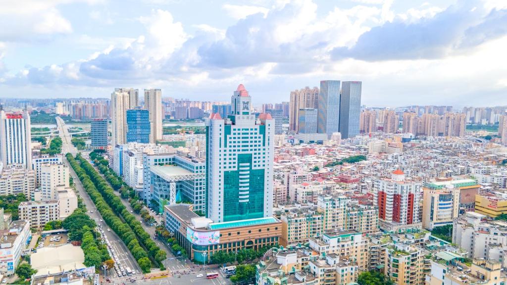 an aerial view of a city with tall buildings at C&D Hotel Quanzhou in Quanzhou