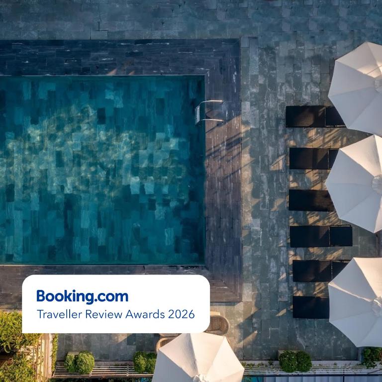 a rendering of a swimming pool with umbrellas at Rosaleen Boutique Hotel in Hue