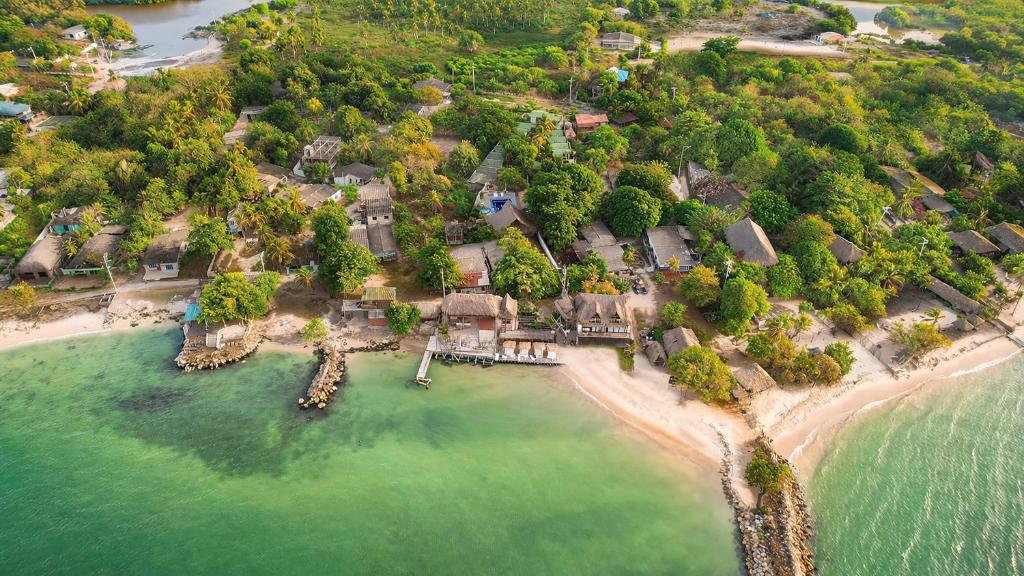 an aerial view of a home on a beach at Marazao Beach Hotel & Wellness in Tierra Bomba