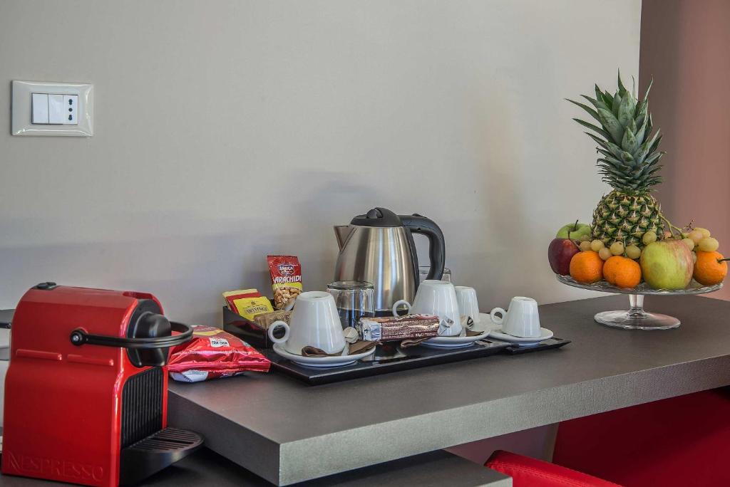 Príslušenstvo na prípravu kávy alebo čaju v ubytovaní Via Veneto Prestige Rooms