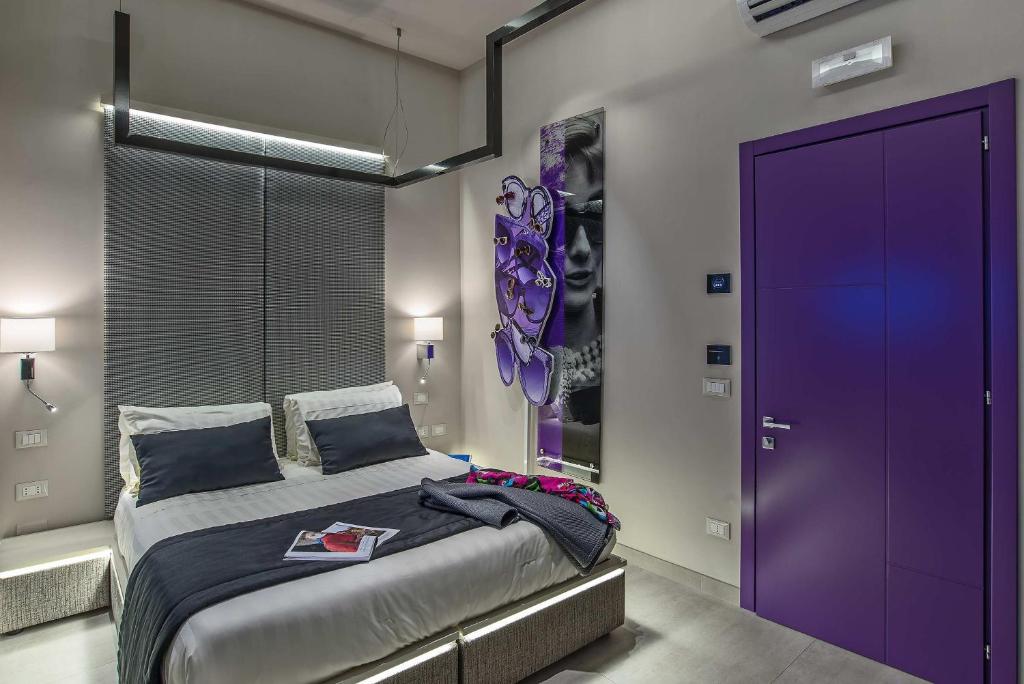 Posteľ alebo postele v izbe v ubytovaní Via Veneto Prestige Rooms