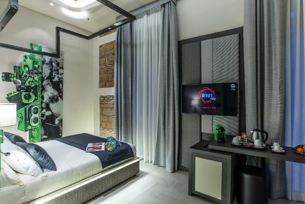 Posteľ alebo postele v izbe v ubytovaní Via Veneto Prestige Rooms