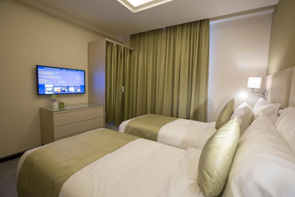 Postel nebo postele na pokoji v ubytování Ararat Resort Tsaghkadzor