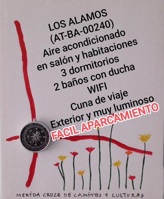 a medal with a picture of flowers on a card at Los Álamos in Mérida