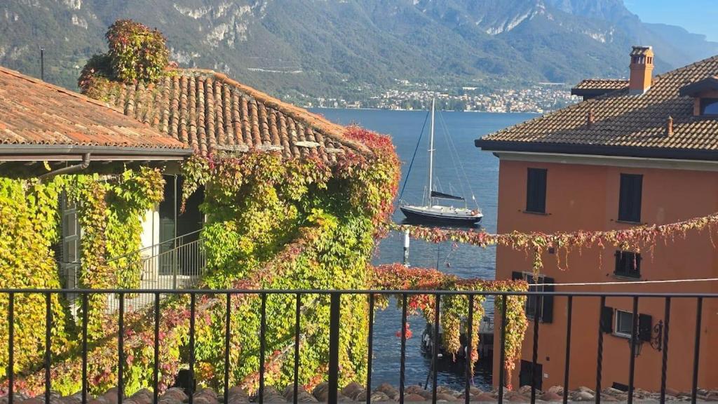 a view of a harbor with a boat in the water at lucia in Bellagio