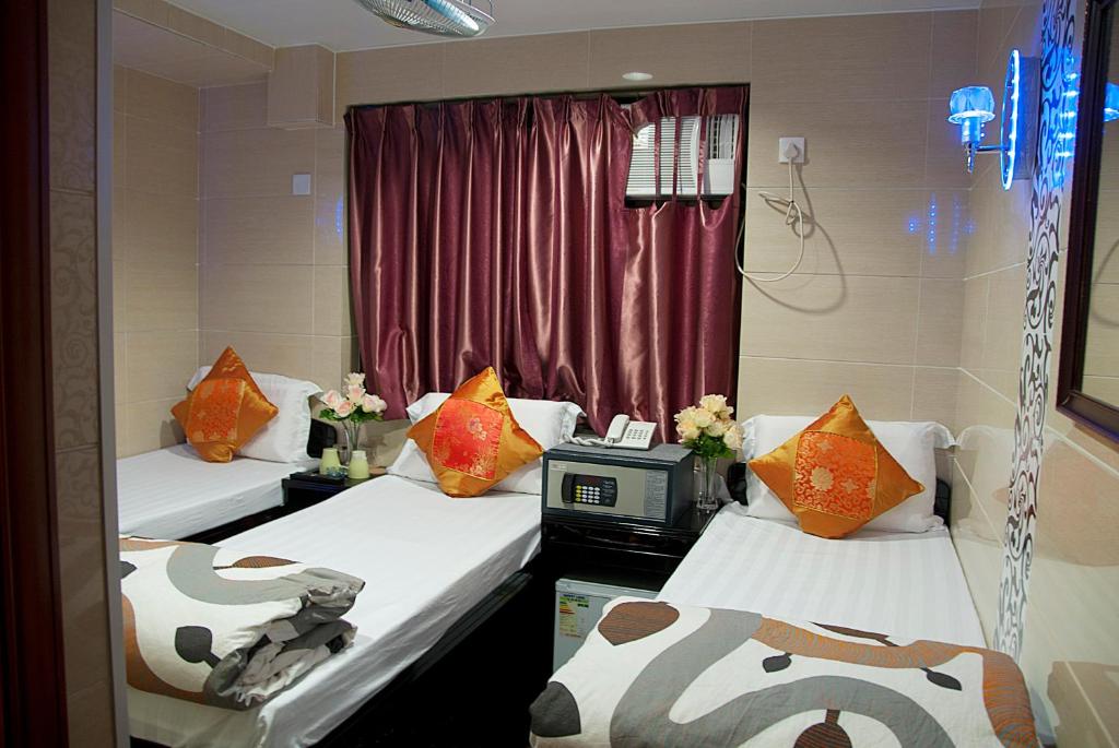 Postel nebo postele na pokoji v ubytování New Tokyo Hostel