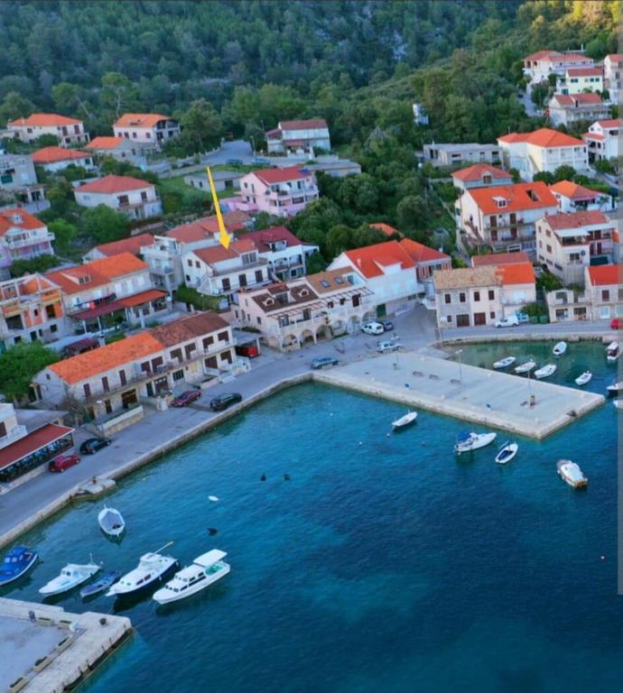 an aerial view of a town with boats in the water at Apartment Nela in Brna