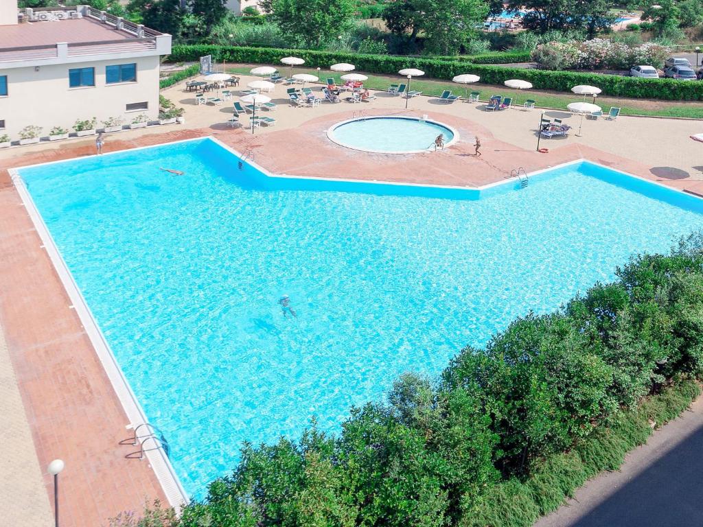 an overhead view of a large swimming pool at Apartment Santa Costanza-1 by Interhome in San Vincenzo