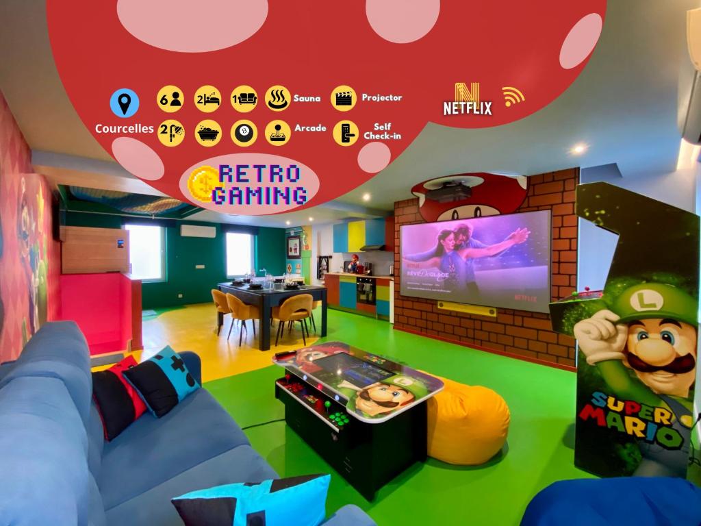 a childrens room with a tv and a play area at Retro Gaming Mood - Arcade Games - Jacuzzi - Sauna - Switch 2 in Courcelles