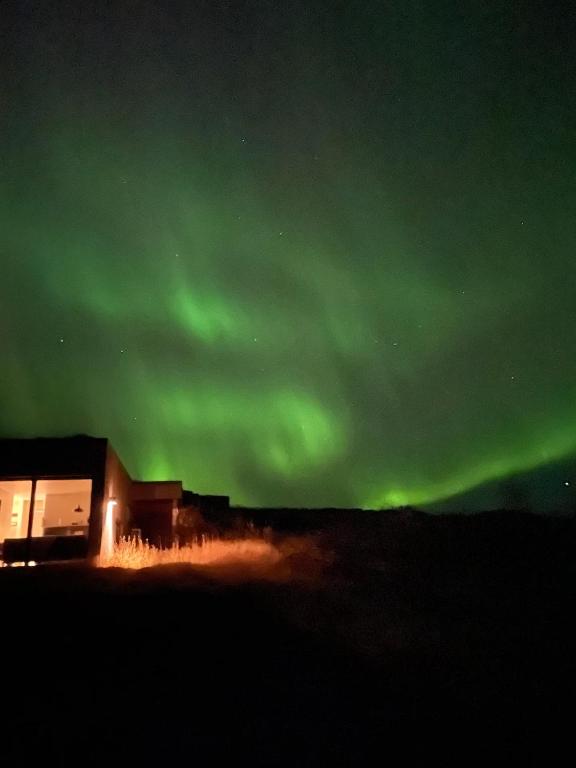 an image of the northern lights in the sky at Efri Torfa - Luxury in Nature - Peaceful & Cosy in Kirkjubæjarklaustur
