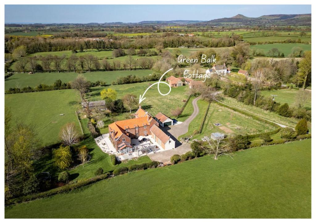 an aerial view of a house with a soccer ball on it at Green Balk Cottage in Stokesley
