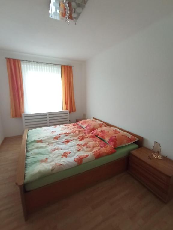 Llit o llits en una habitació de Ferienwohnung Aflenz