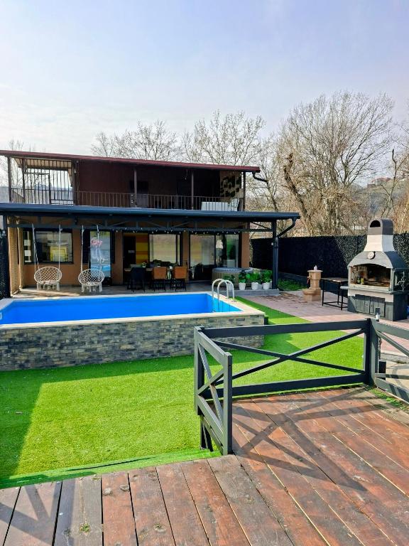 an image of a house with a swimming pool at Sap Pool House in Ritopek
