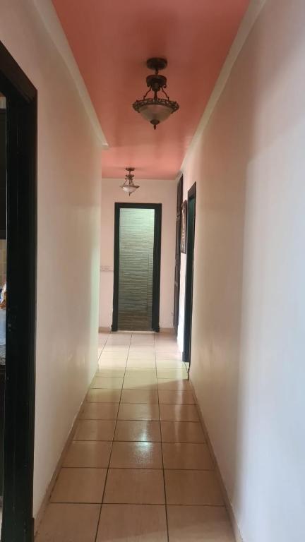 a hallway of a house with a ceiling fan at Appartement 2 chambres bon emplacement Casablanca in Casablanca
