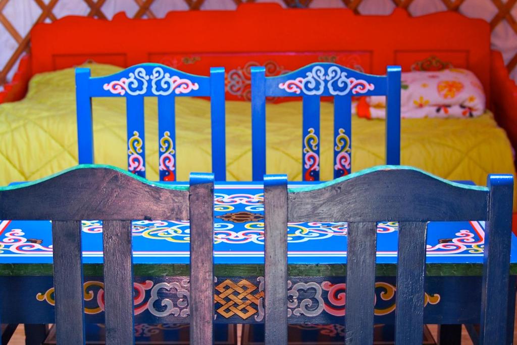 Postel nebo postele na pokoji v ubytování Le Village Insolite yourte et roulotte
