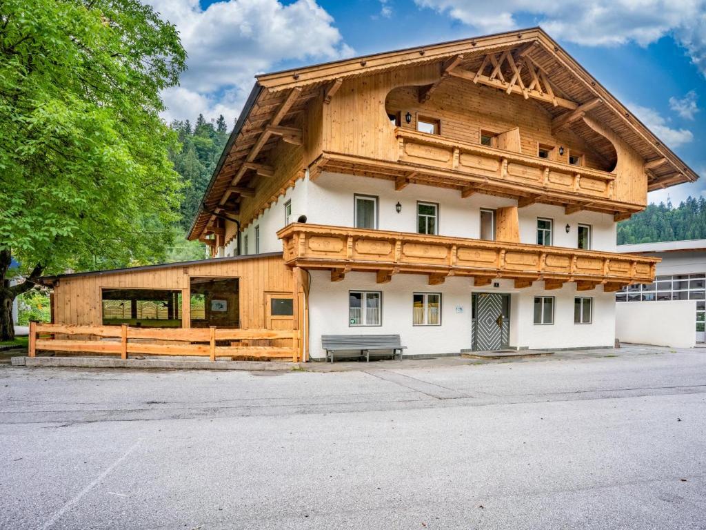 a large house with a gambrel roof at Grieswirt L in Itter