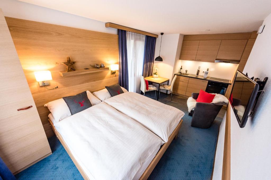 Postel nebo postele na pokoji v ubytování Chalet Achat