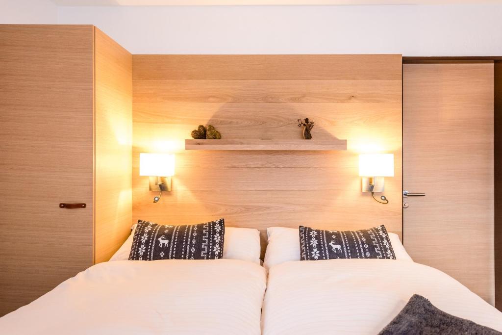 Postel nebo postele na pokoji v ubytování Chalet Achat