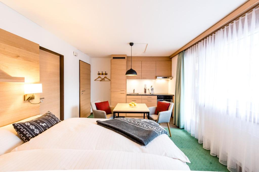 Postel nebo postele na pokoji v ubytování Chalet Achat