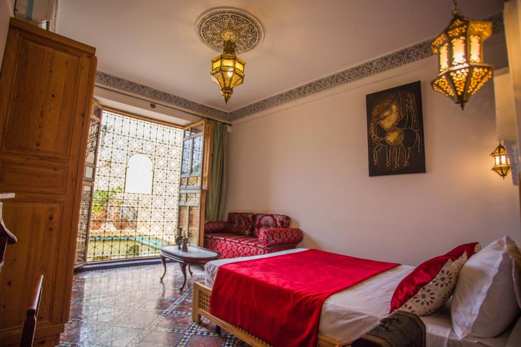 Postel nebo postele na pokoji v ubytování Riad Vega