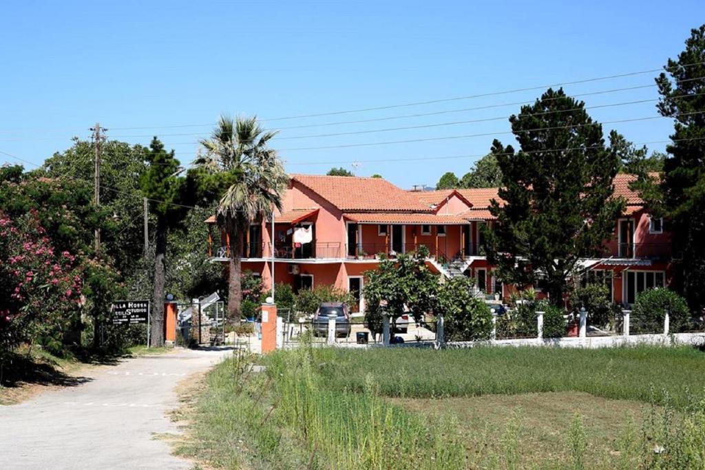 a house on the side of a road at Vassilis Studio's in Perivólion