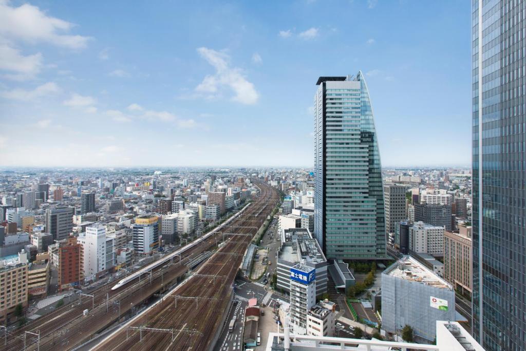 a view of a city with a tall building at Nagoya JR Gate Tower Hotel in Nagoya