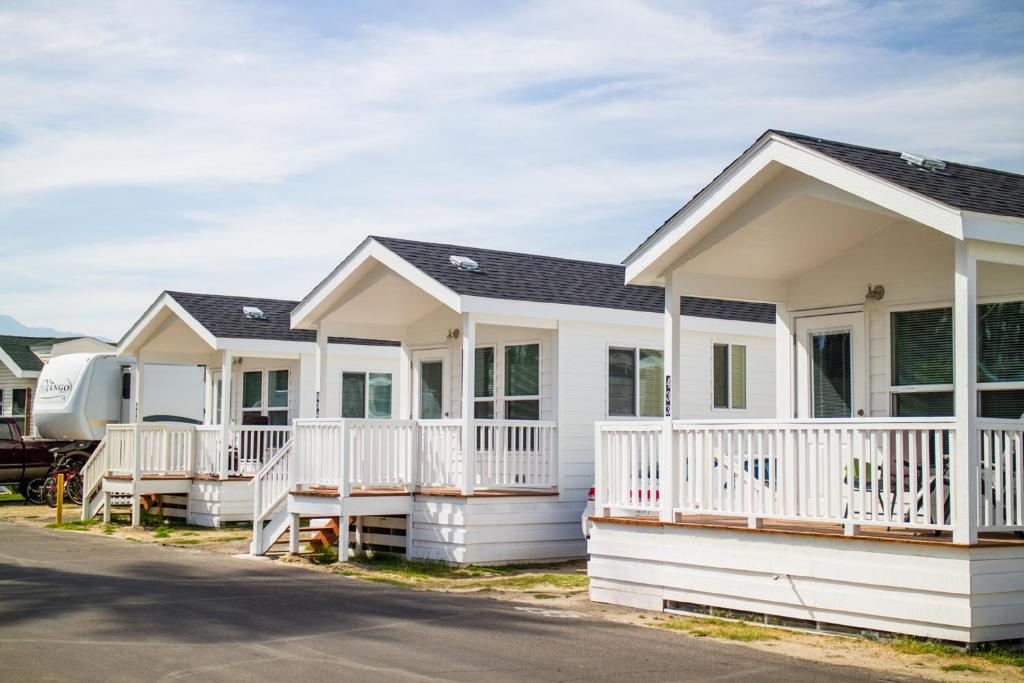 a row of modular homes in a subdivision at Palm Springs Camping Resort Cottage 1 in Palm Desert