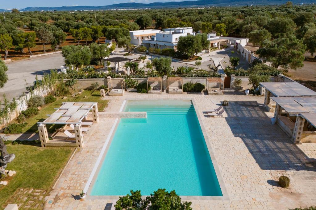 an aerial view of a pool at a villa at Masseria Capricella in Fasano