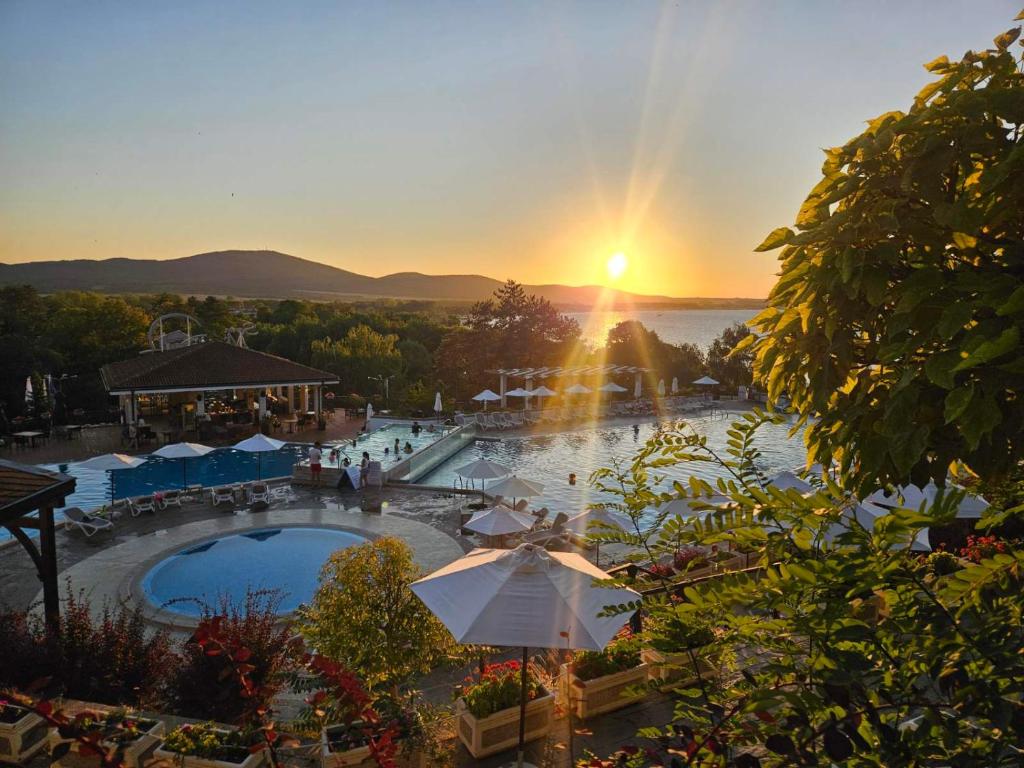 a view of a swimming pool at a resort at Blue Marina Sunset in Sozopol